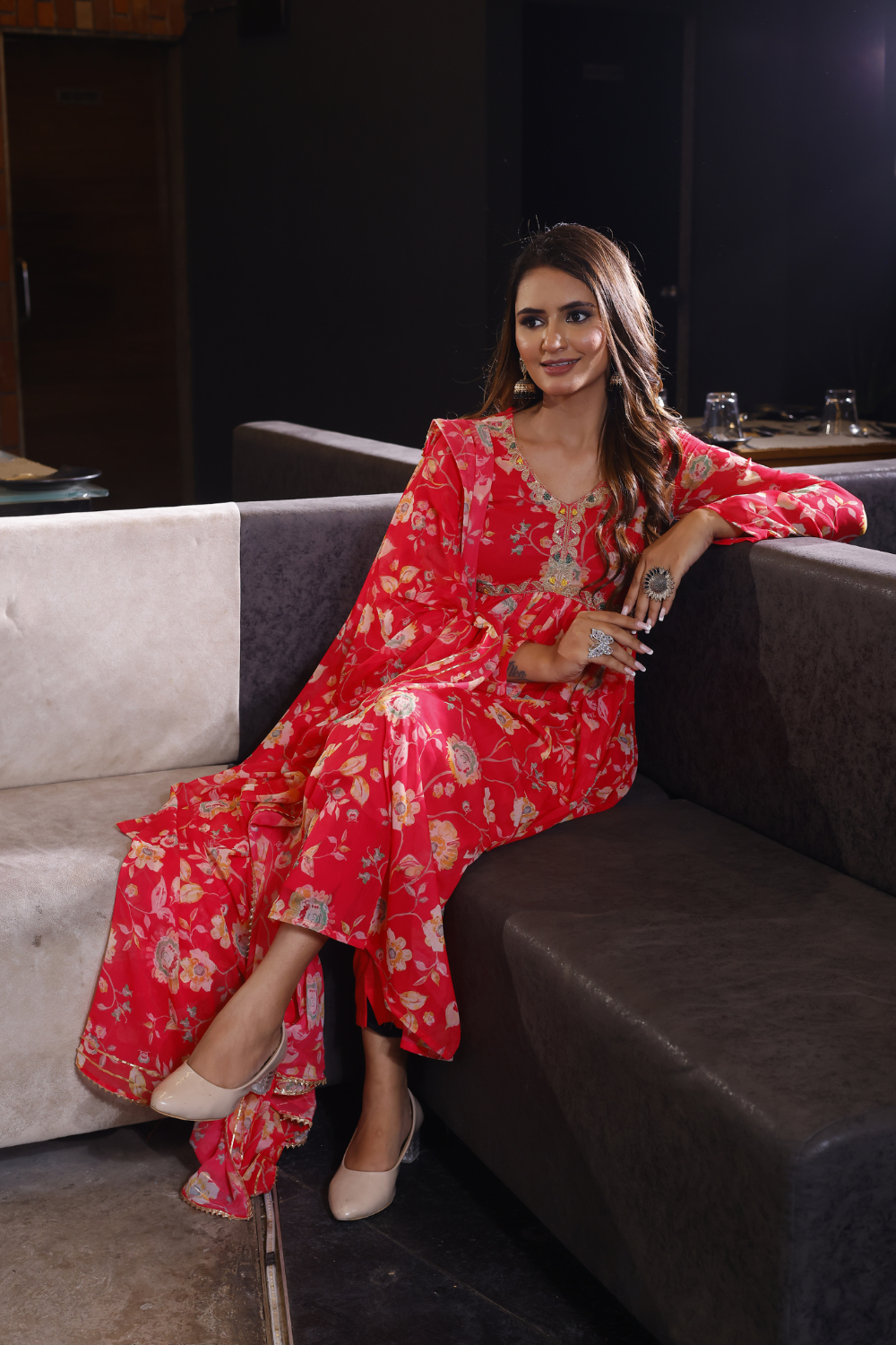 Red suit set featuring floral design in elegant chinon fabric.