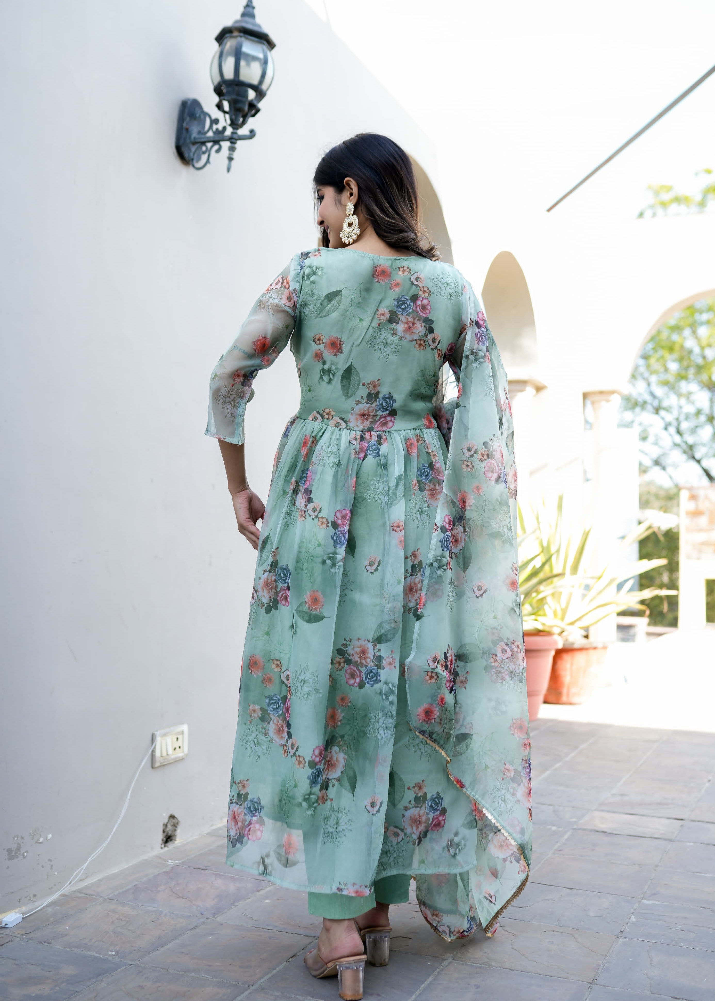 Organza Anarkali Suit Set Adorned With Elegant Pista Green Floral Motifs