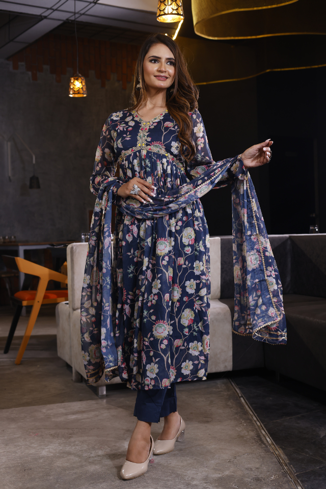 Blue suit set featuring floral design in elegant chinon fabric.